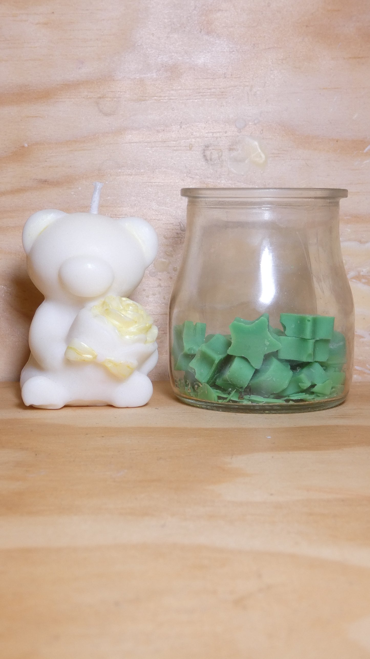 Espelma os amb rosa blanc