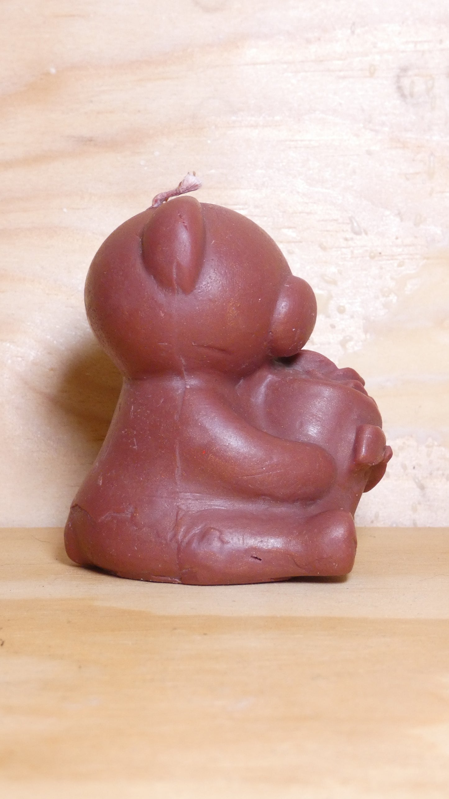 Espelma os amb rosa marró