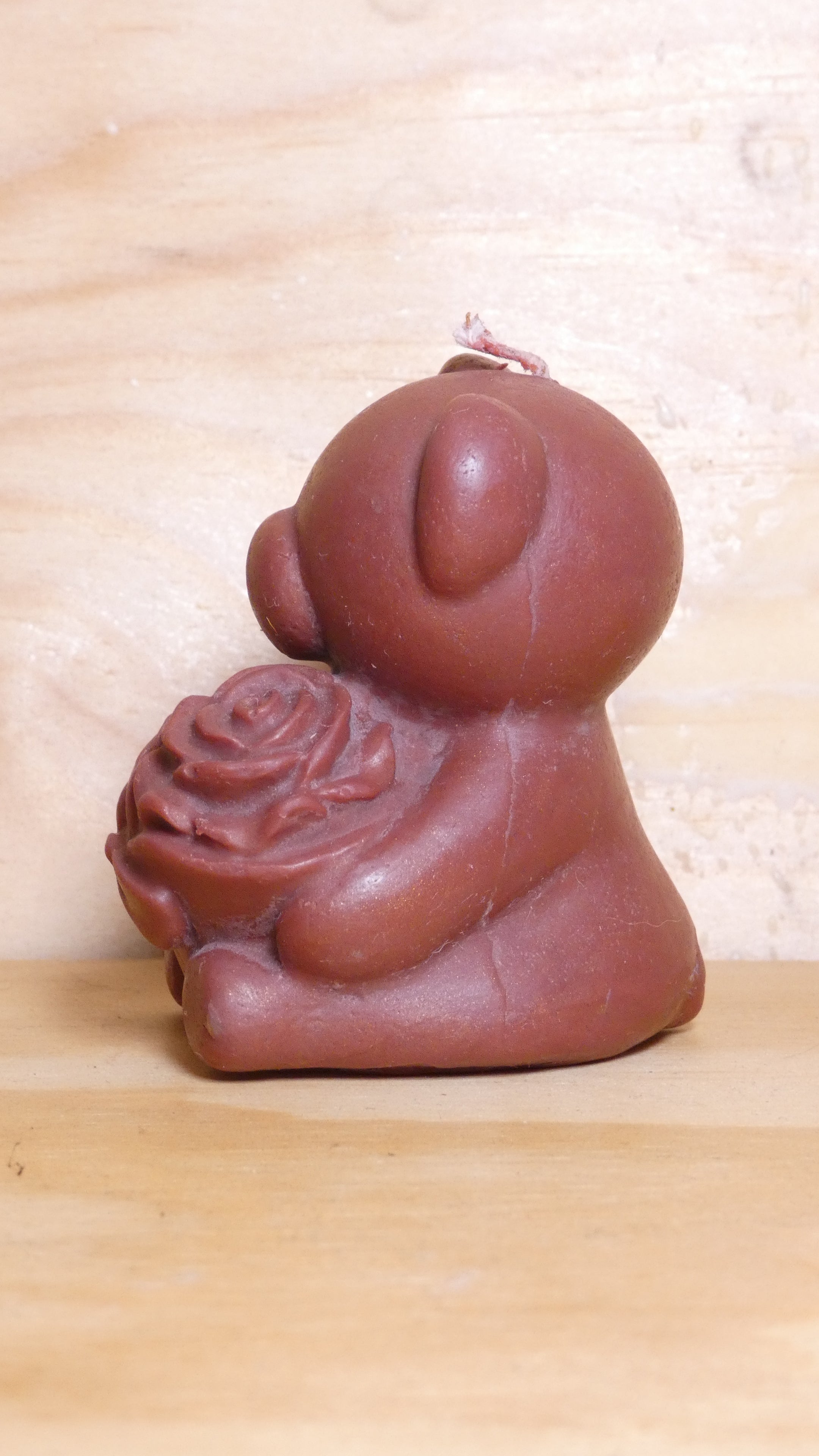 Espelma os amb rosa marró