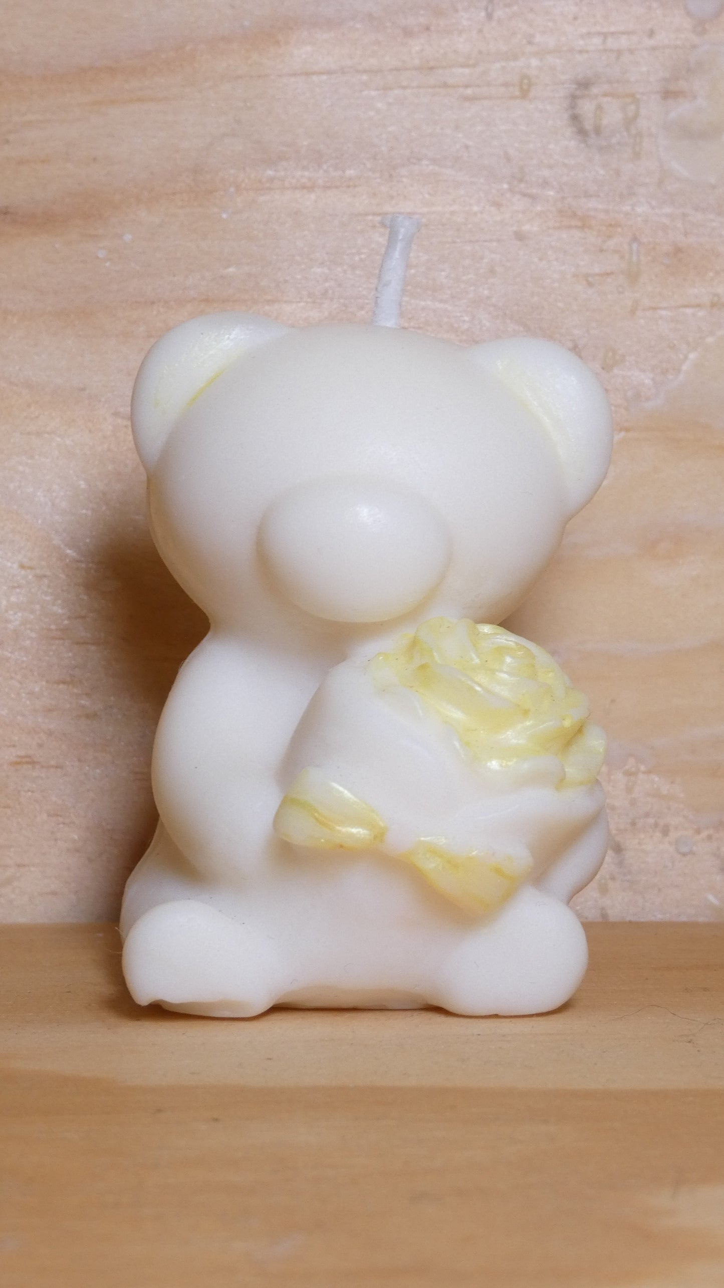 Espelma os amb rosa blanc