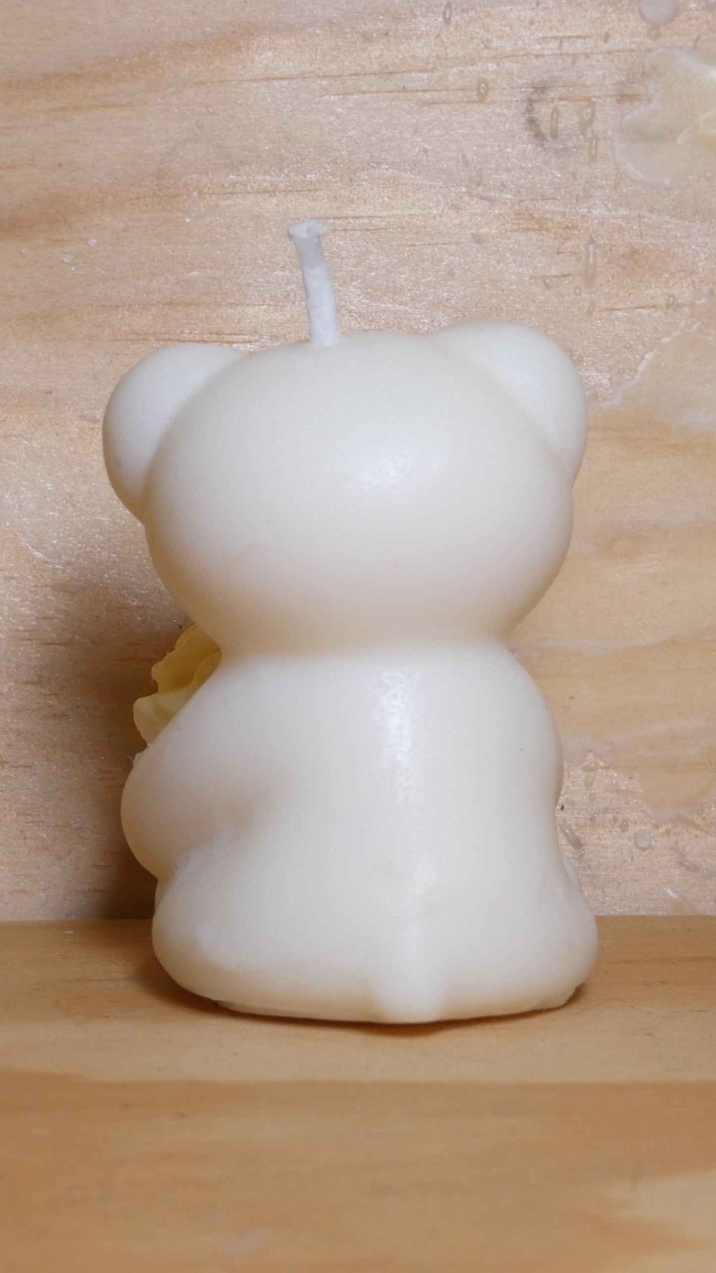 Espelma os amb rosa blanc